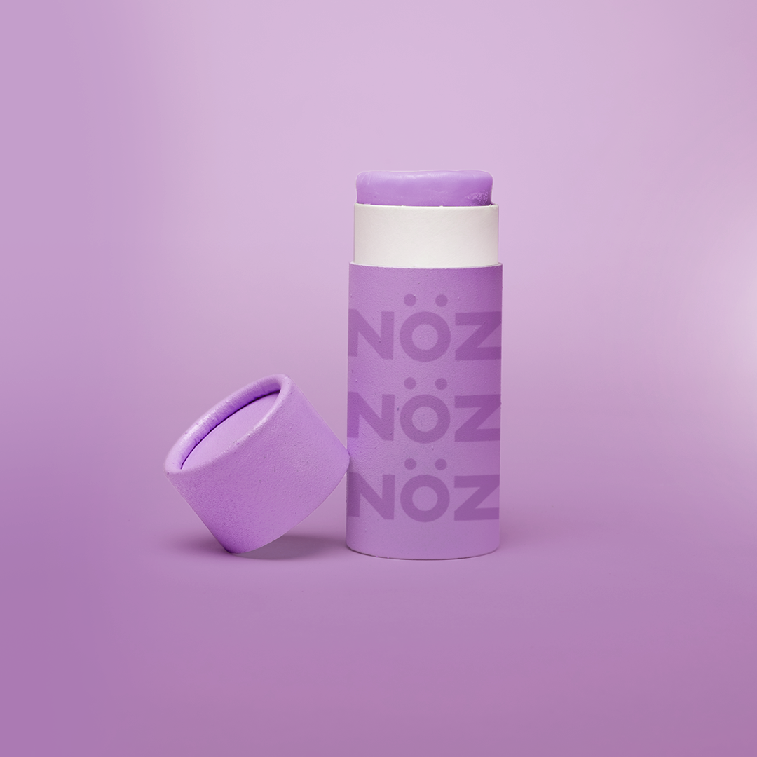 front view of Nöz sunscreen in purple uncapped