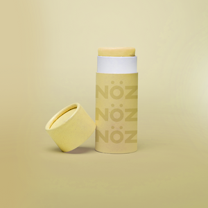 front view of Nöz sunscreen in yellow uncapped